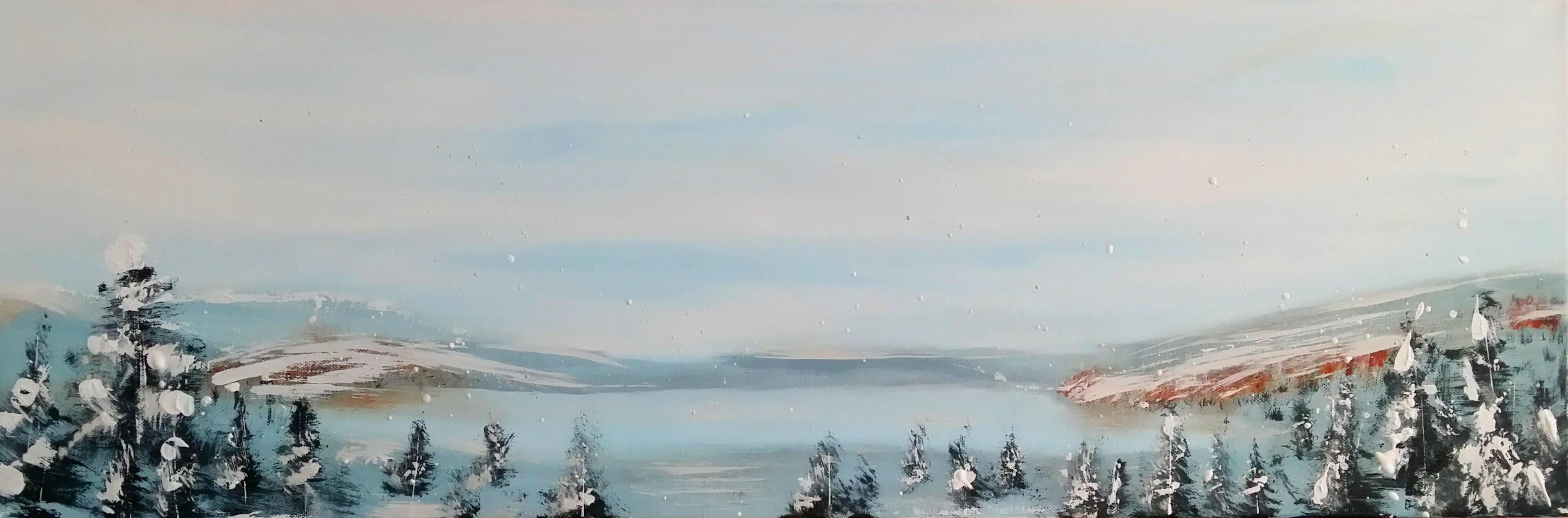 A wide, horizontal landscape painting depicting a serene lake surrounded by snow-dusted hills and evergreen trees. The composition features a pale, misty sky and soft blue-toned water, with delicate white splatters suggesting a light, fresh snowfall.