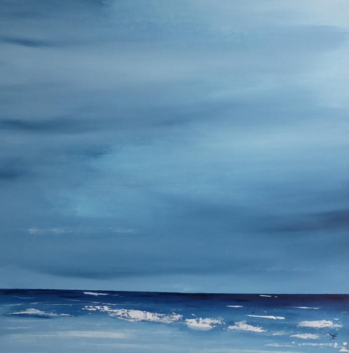 A square, moody landscape dominated by deep, atmospheric blues. A vast, heavy sky with subtle grey cloud formations meets a dark navy horizon line. The foreground features expressive white brushstrokes suggesting the foam of breaking waves.